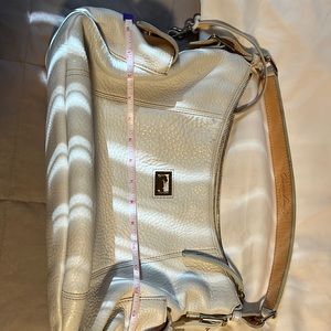Winter white Dooney and burke handbag